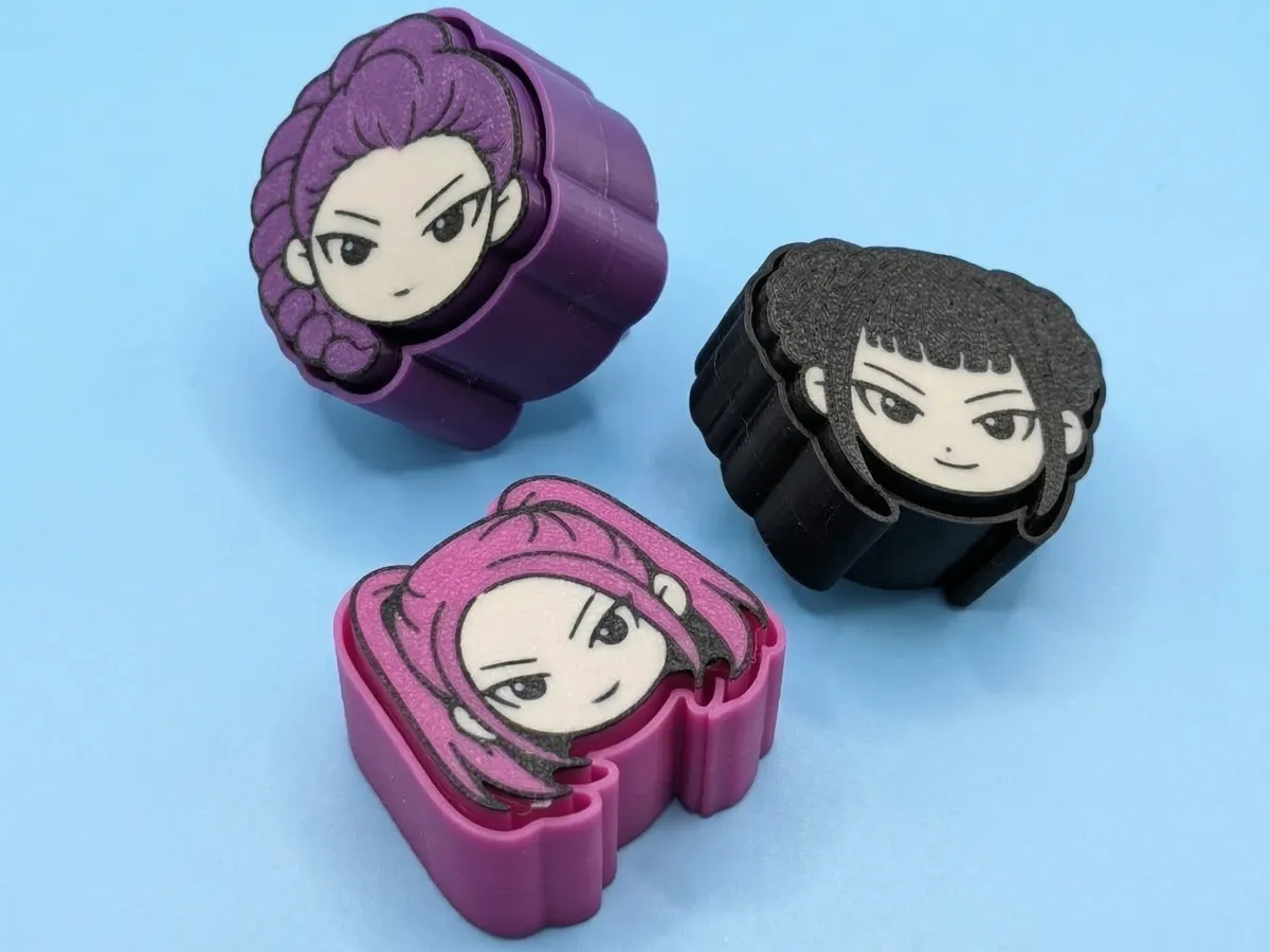 Three 3D printed KPop Demon Hunters Huntrix character fidget clickers